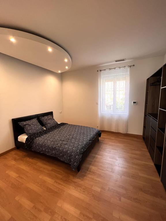 Posteľ alebo postele v izbe v ubytovaní Maison avec Jacuzzi Marseille