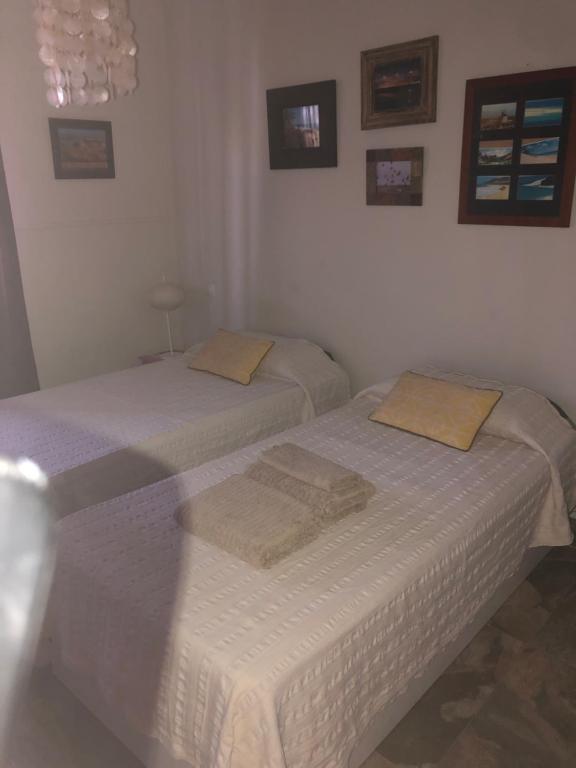 Posteľ alebo postele v izbe v ubytovaní Costa Antigua II