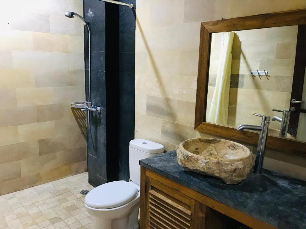 Koupelna v ubytování Ayu Bisma Homestay