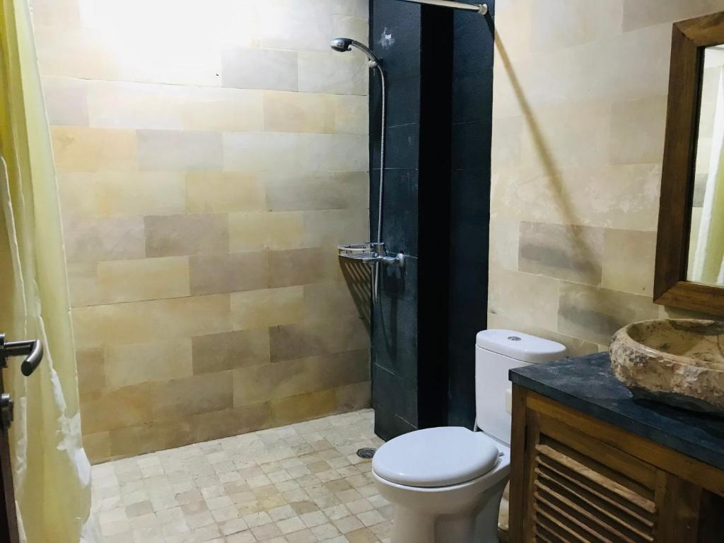 Koupelna v ubytování Ayu Bisma Homestay