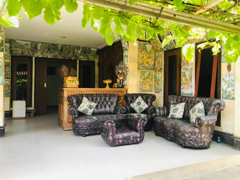 Posezení v ubytování Ayu Bisma Homestay