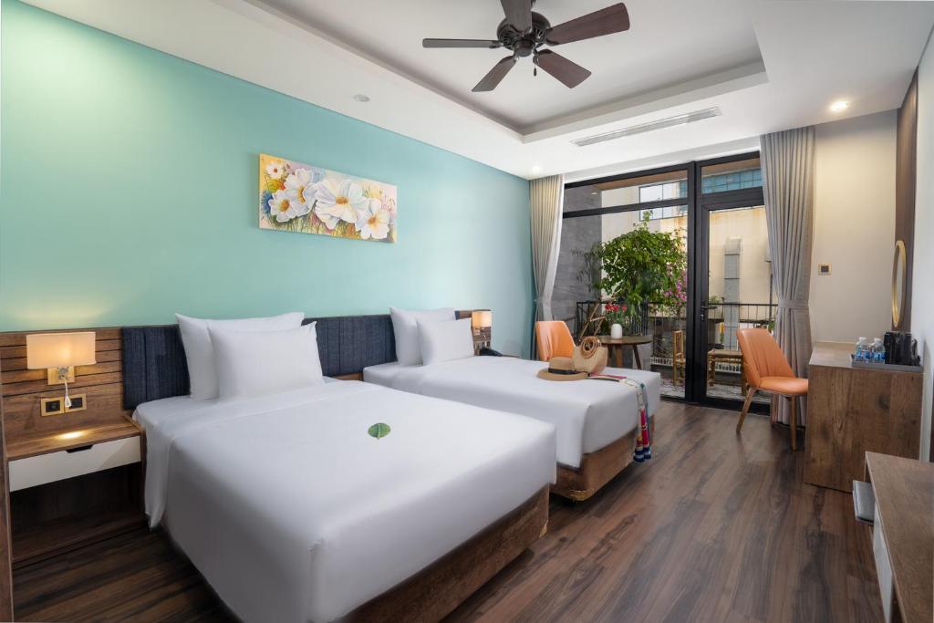 Phòng Deluxe 2 Giường Đơn có Ban công và Nhìn ra Thành phố