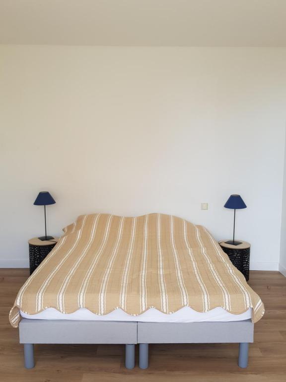 Una cama o camas en una habitaci&oacute;n de Villa sur la corniche vue mer