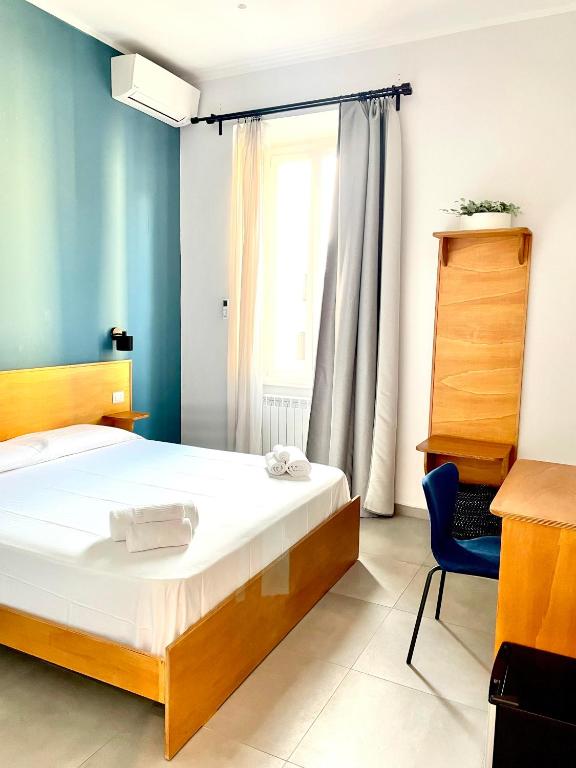 Posteľ alebo postele v izbe v ubytovaní Casa Cecilia