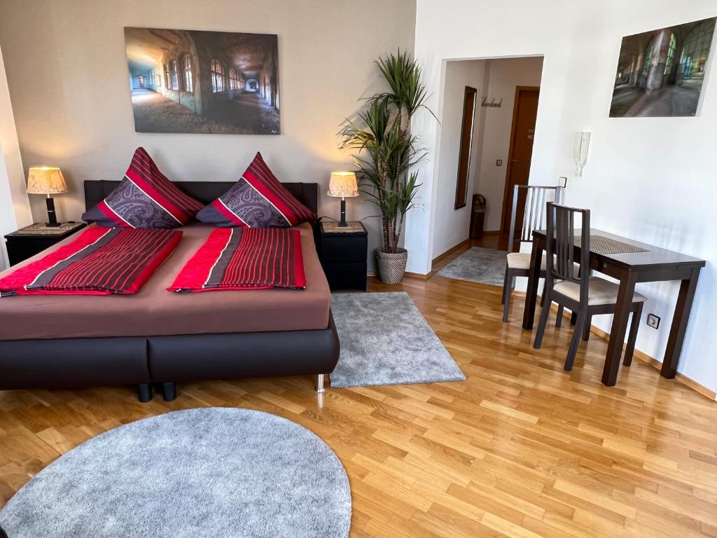 Postel nebo postele na pokoji v ubytování Pension-Leipzig-Süd