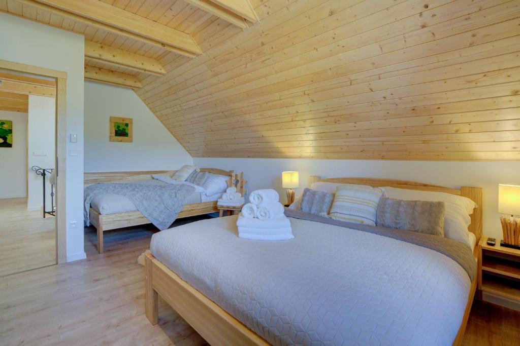 Postel nebo postele na pokoji v ubytování Chalet West - Zuberec