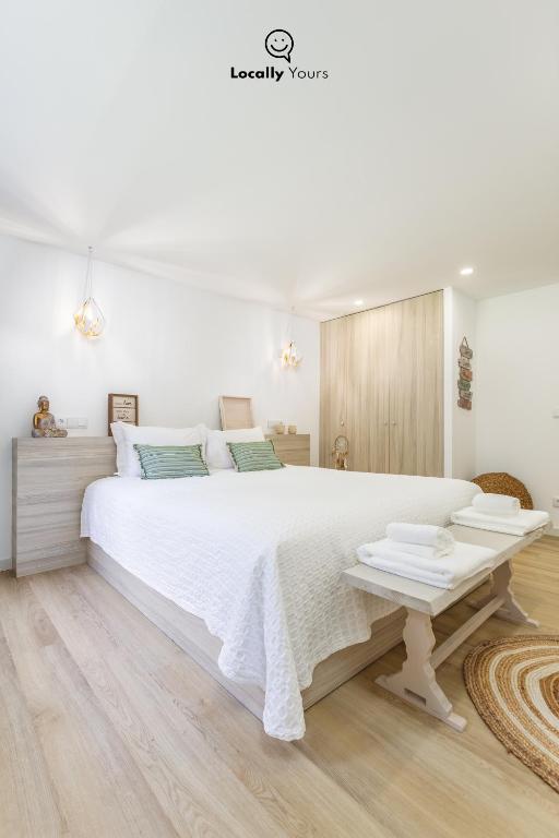 Uma cama ou camas num quarto em Casa do Monte Locally Yours