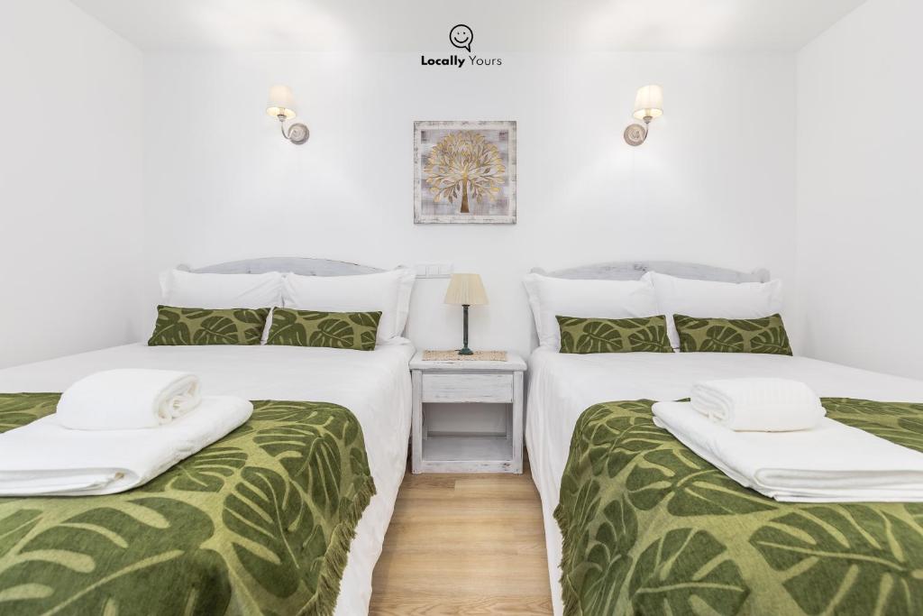 Uma cama ou camas num quarto em Casa do Monte Locally Yours