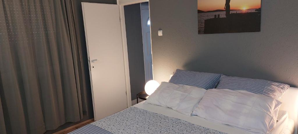 Postel nebo postele na pokoji v ubytování Villa Mery