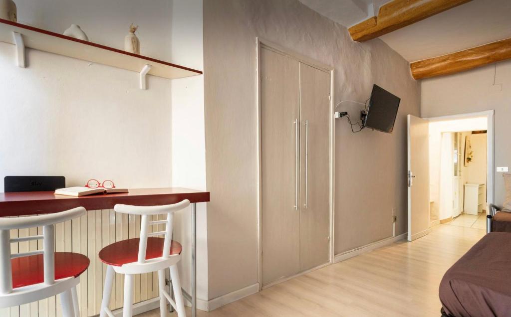 A television and/or entertainment centre at Perugia Historic Center Apartment