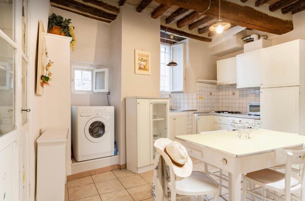 A kitchen or kitchenette at Perugia Historic Center Apartment
