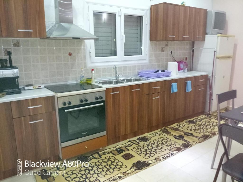 Kuchyň nebo kuchyňský kout v ubytování SARDINIA LUX HOUSE 697 4349 5 12