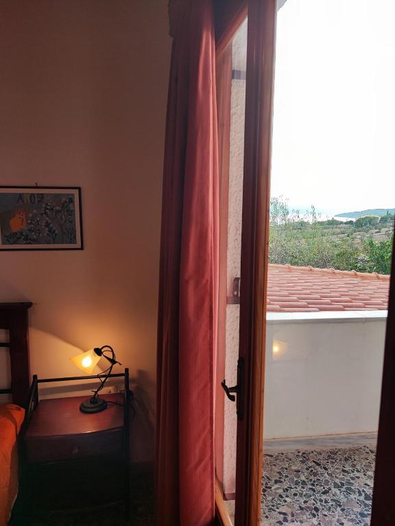 Balkón alebo terasa v ubytovaní THOMAS VIEW Εξοχικό σπίτι με θέα στη θάλασσα