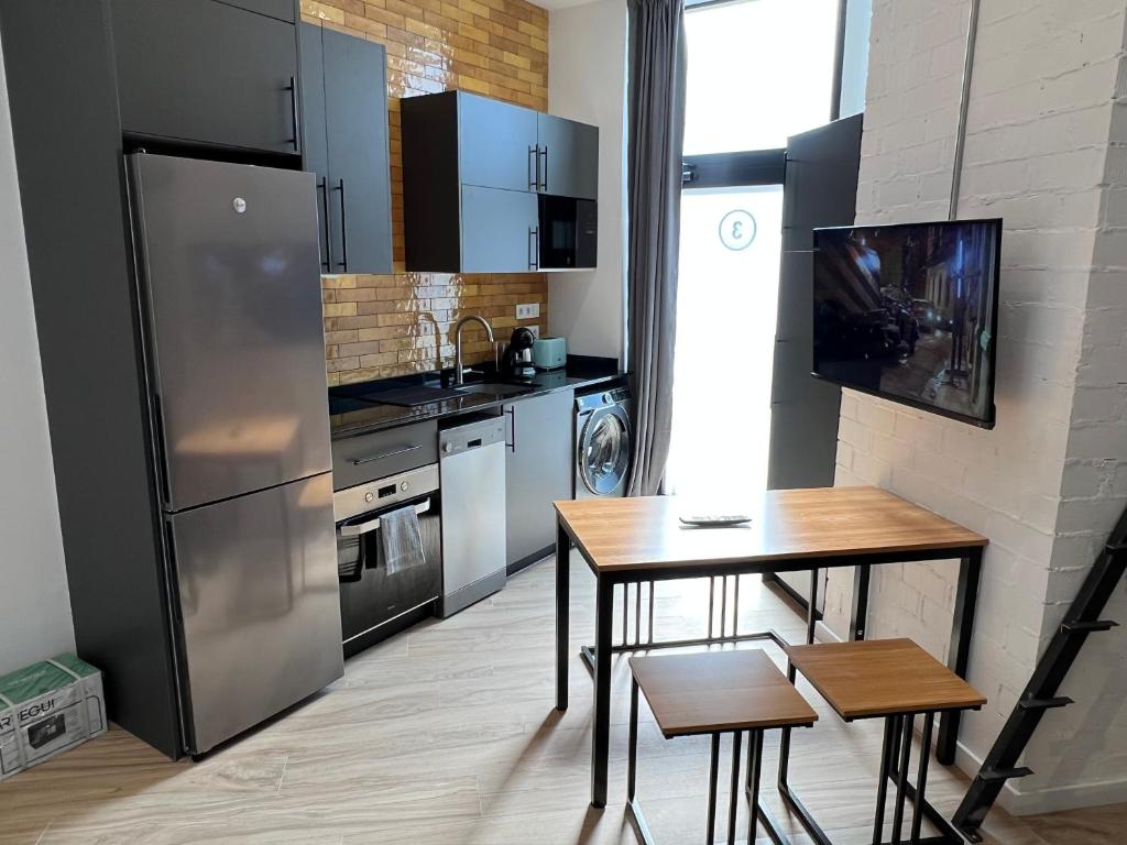 Kuchyňa alebo kuchynka v ubytovaní Vip Apartments Valencia