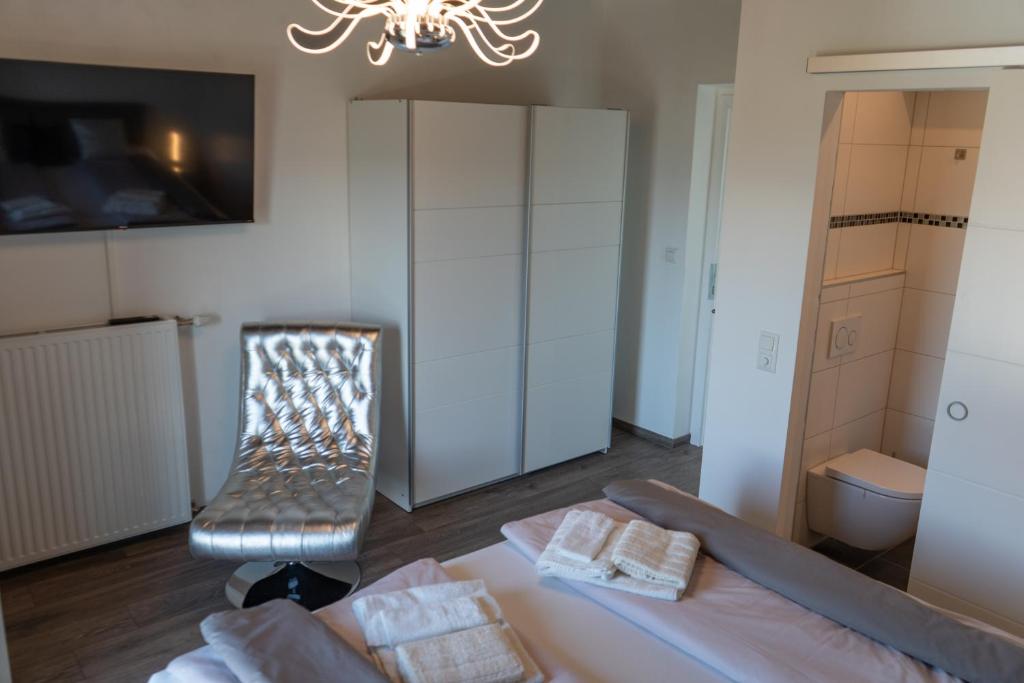 Posteľ alebo postele v izbe v ubytovaní Rooms21