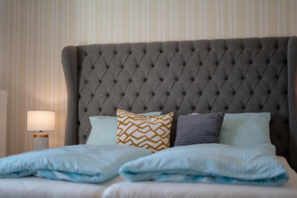 Posteľ alebo postele v izbe v ubytovaní Rooms21