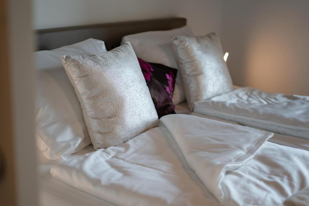 Posteľ alebo postele v izbe v ubytovaní Rooms21