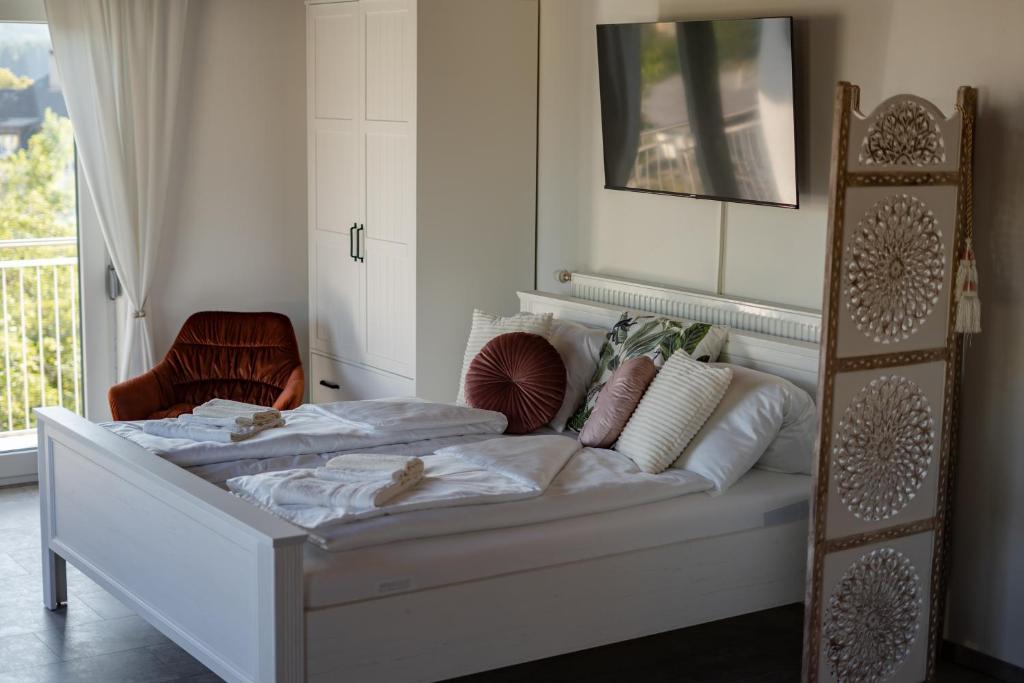 Posteľ alebo postele v izbe v ubytovaní Rooms21