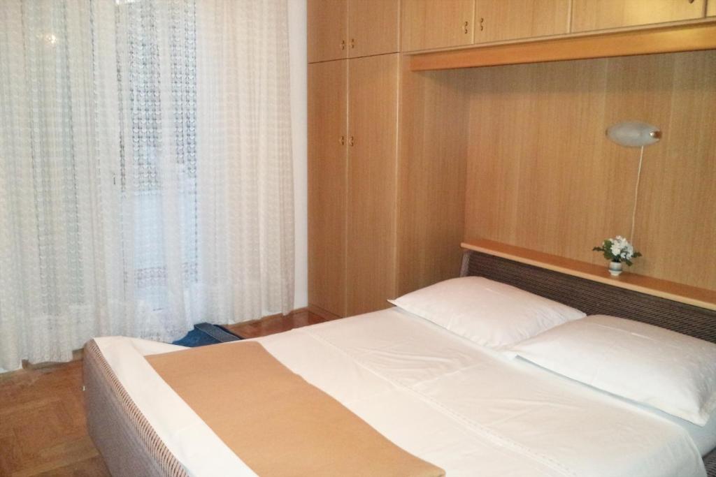 Postel nebo postele na pokoji v ubytování Apartments with a parking space Selce, Crikvenica - 5495