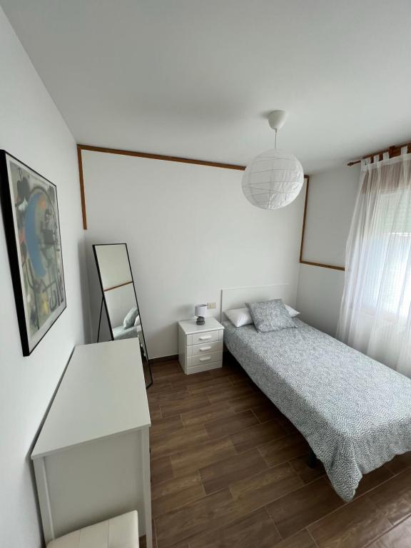 Posteľ alebo postele v izbe v ubytovaní Apartamento Bouzavella Panxón