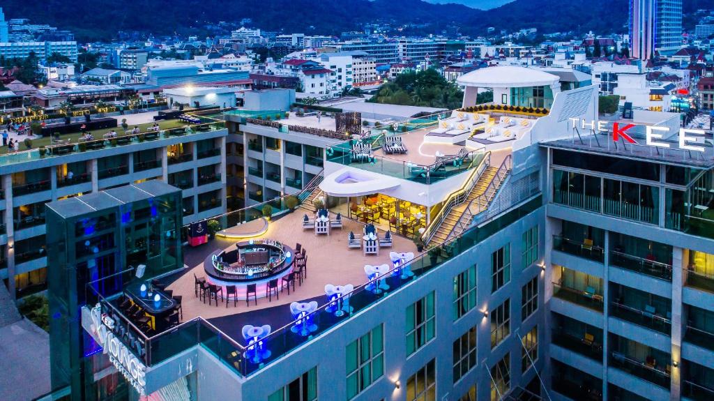 an aerial view of a city at night at The Kee Resort & Spa in Patong Beach