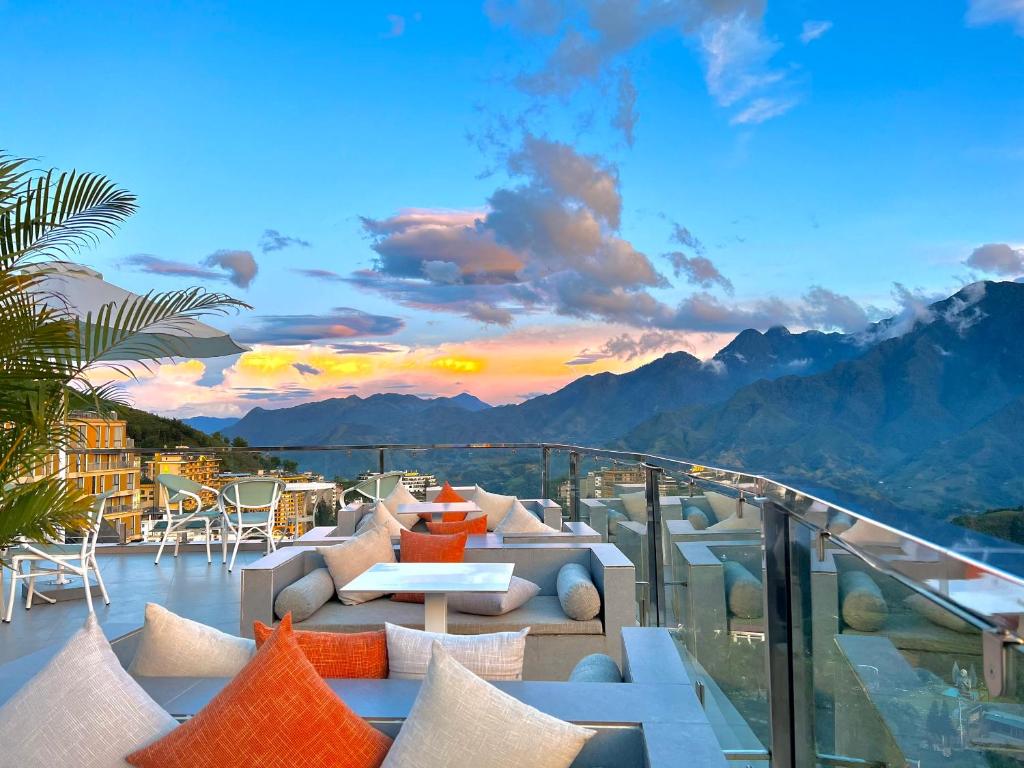 a balcony with a view of the mountains at Sapa Relax Hotel & Spa in Sa Pa