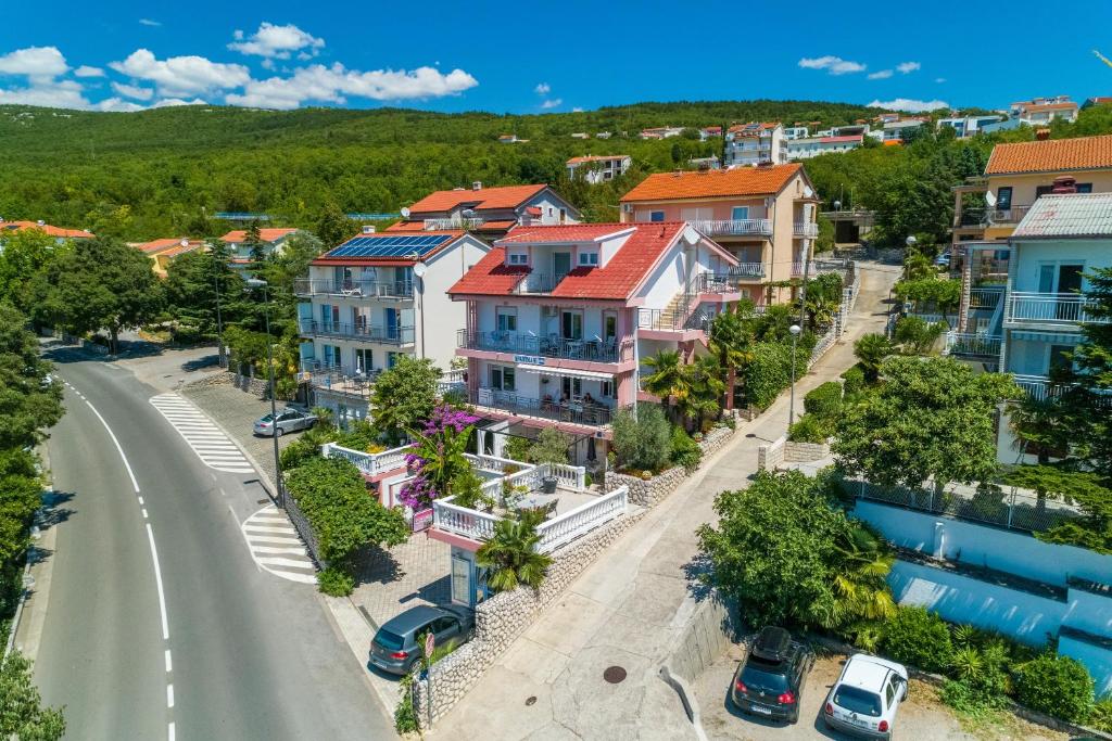 arial view of a city with houses and a road at Studio Crikvenica 5478b in Crikvenica