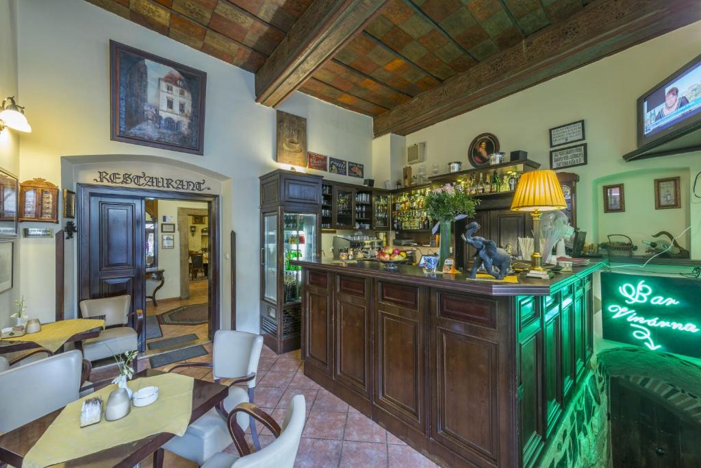 Kuchyň nebo kuchyňský kout v ubytování Hotel Cerny Slon