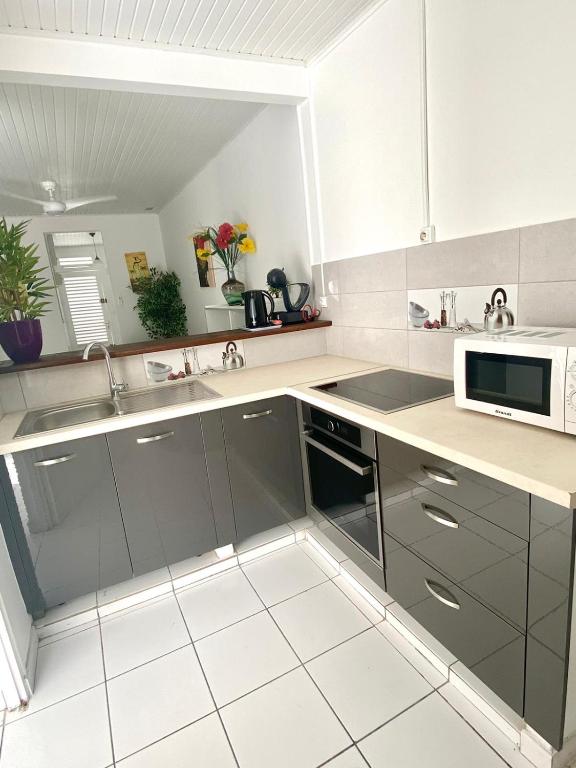 Kuchyň nebo kuchyňský kout v ubytování mariejo location