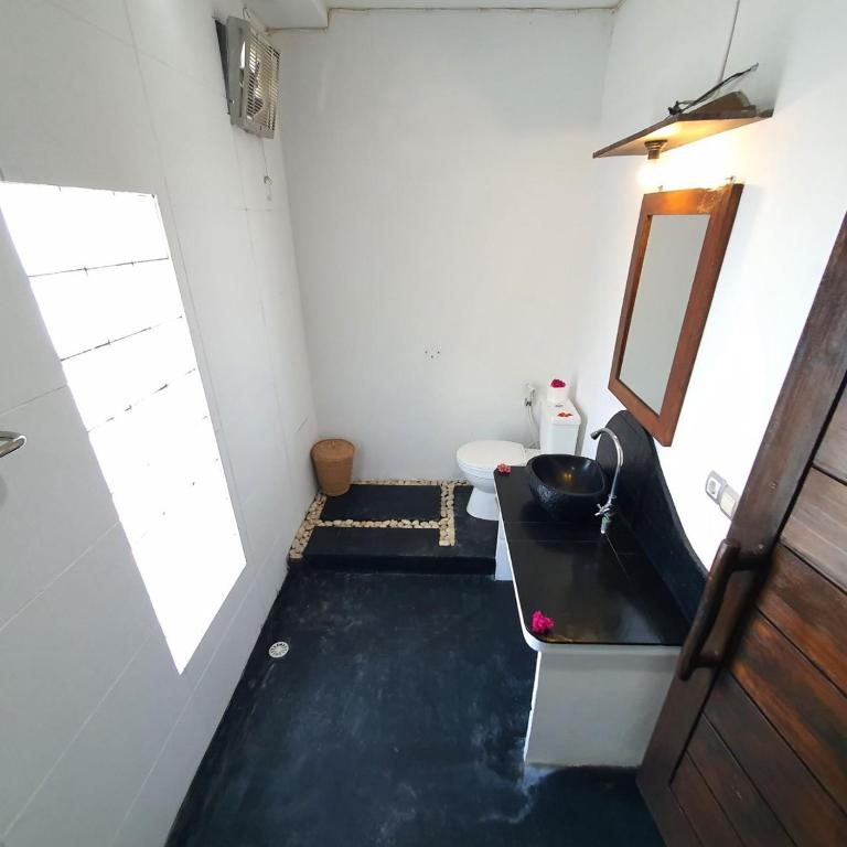 Putra Boyan Cottages - 13