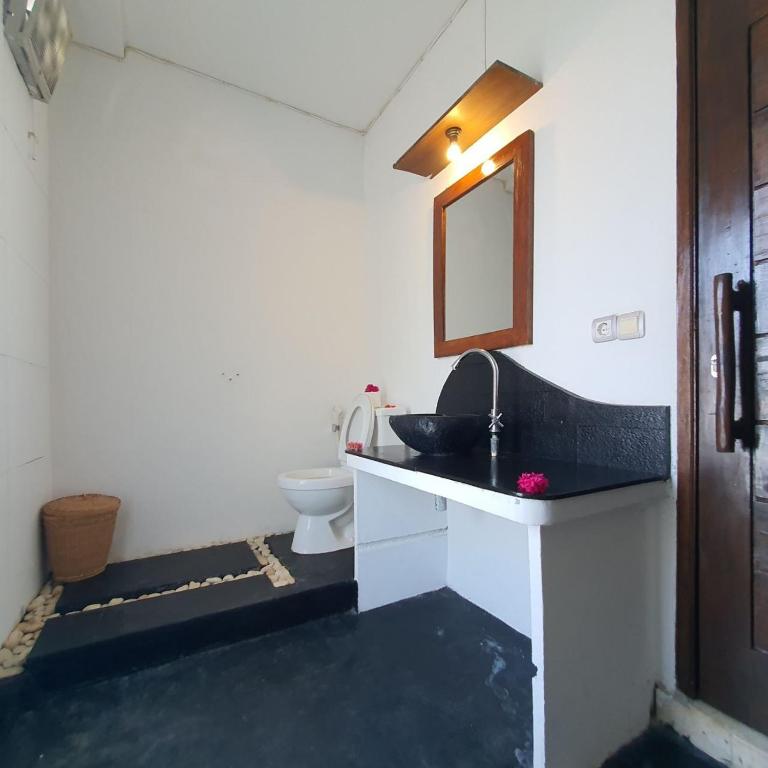 Putra Boyan Cottages - 17