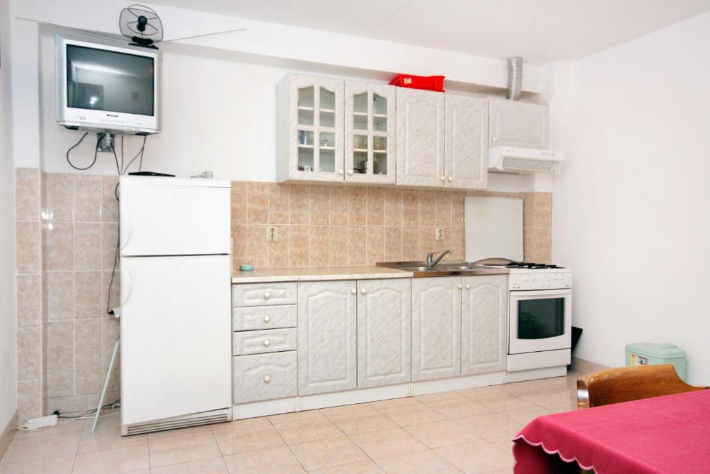 Kuchyň nebo kuchyňský kout v ubytování Apartments by the sea Cove Solotisa, Hvar - 5610