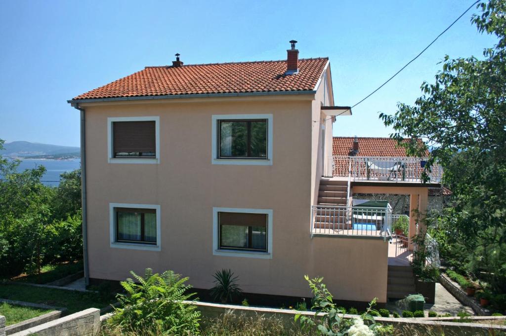 a house on a hill with a view at Apartments with a parking space Dramalj, Crikvenica - 5576 in Dramalj