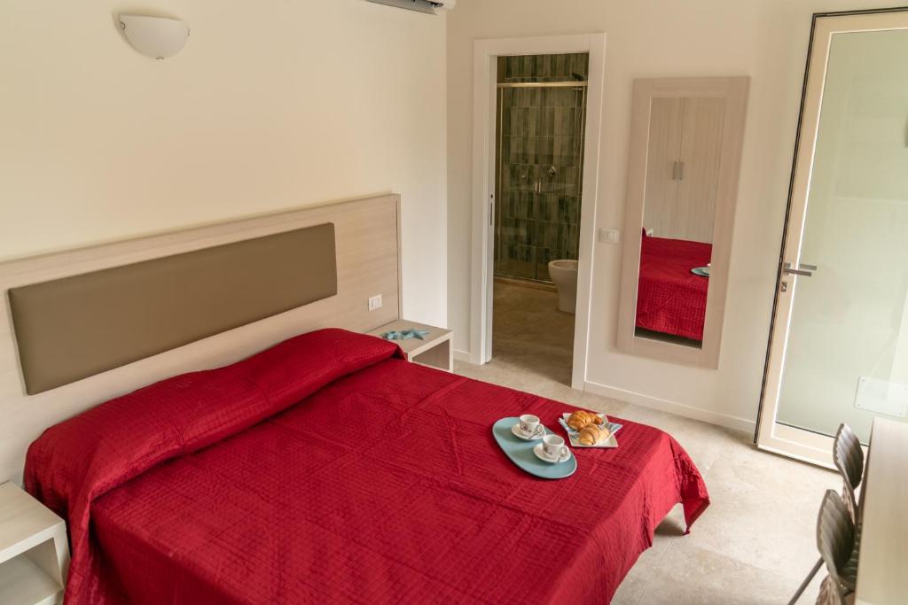 Postel nebo postele na pokoji v ubytování Crystal Camere