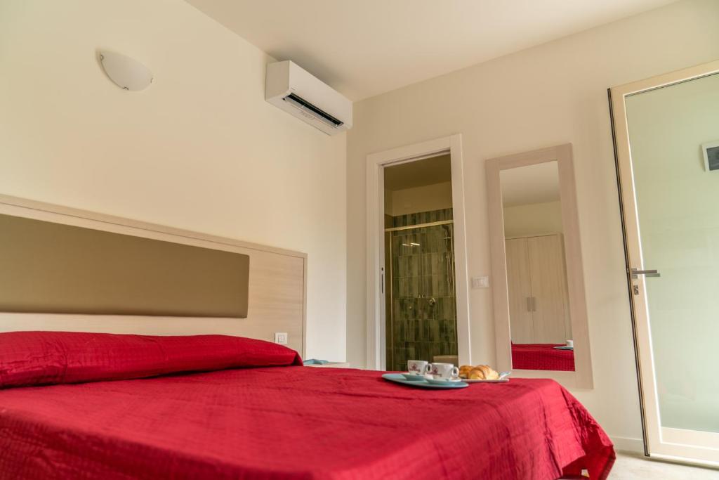 Postel nebo postele na pokoji v ubytování Crystal Camere