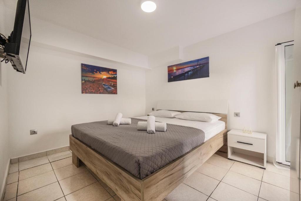 A bed or beds in a room at S&A STUDIO