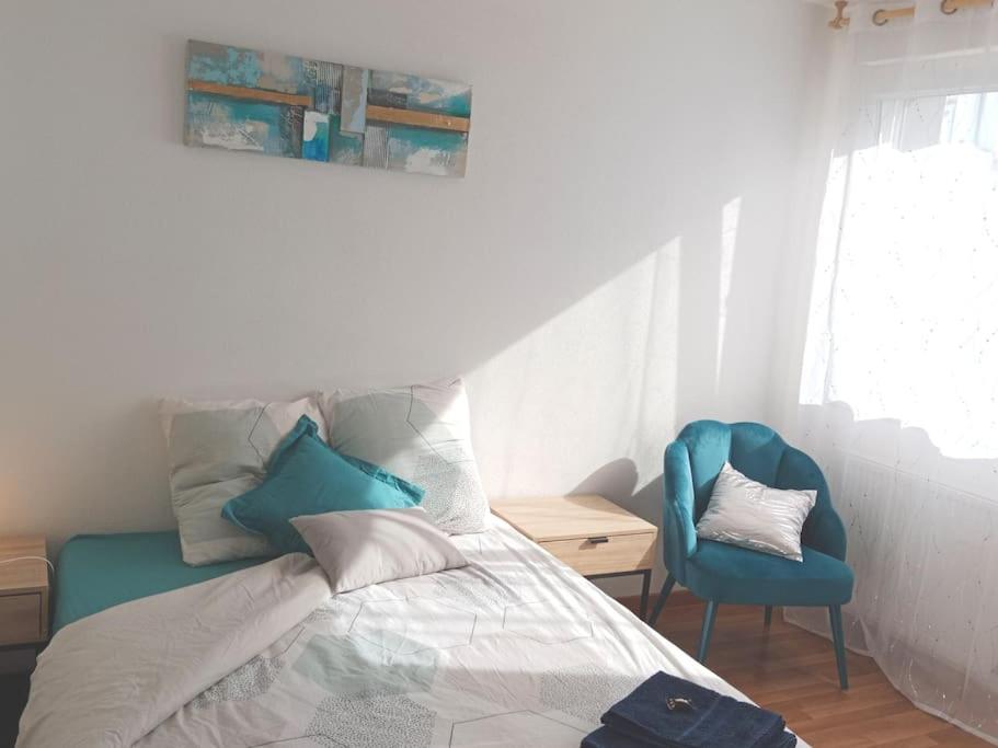 Postel nebo postele na pokoji v ubytování Chambre #2 dans appartement partagé - Proche des Vosges