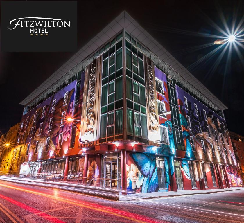 a building with a painting on the side of it at The Fitzwilton Hotel in Waterford