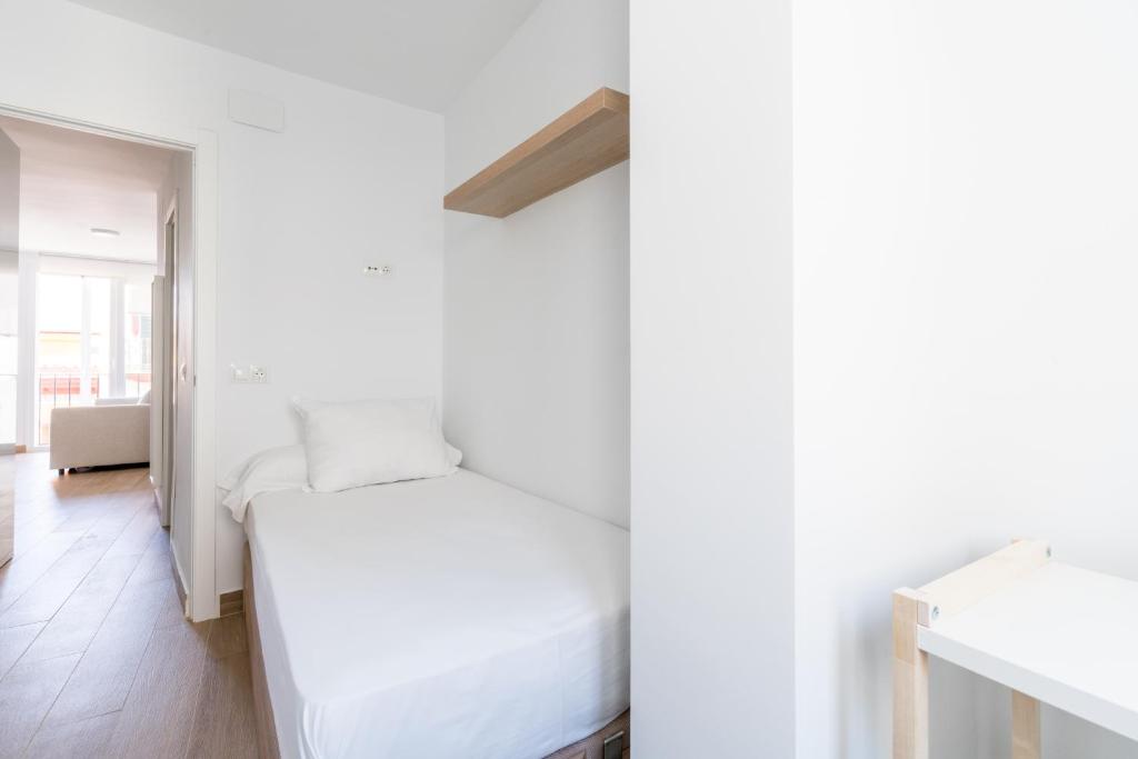 Postel nebo postele na pokoji v ubytování Holi-Rent Pureza