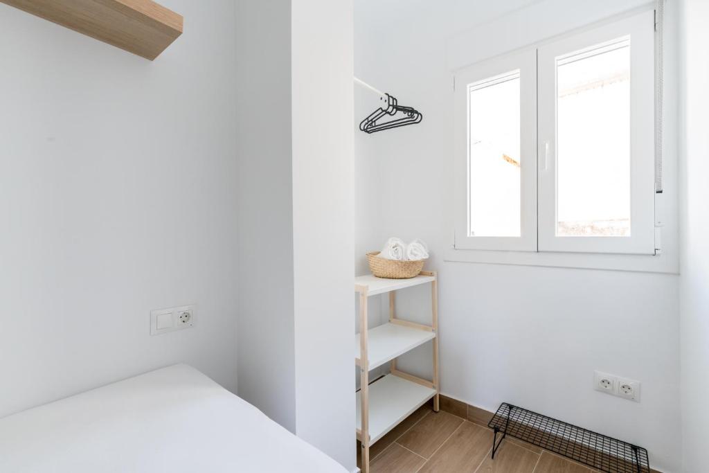 Postel nebo postele na pokoji v ubytování Holi-Rent Pureza