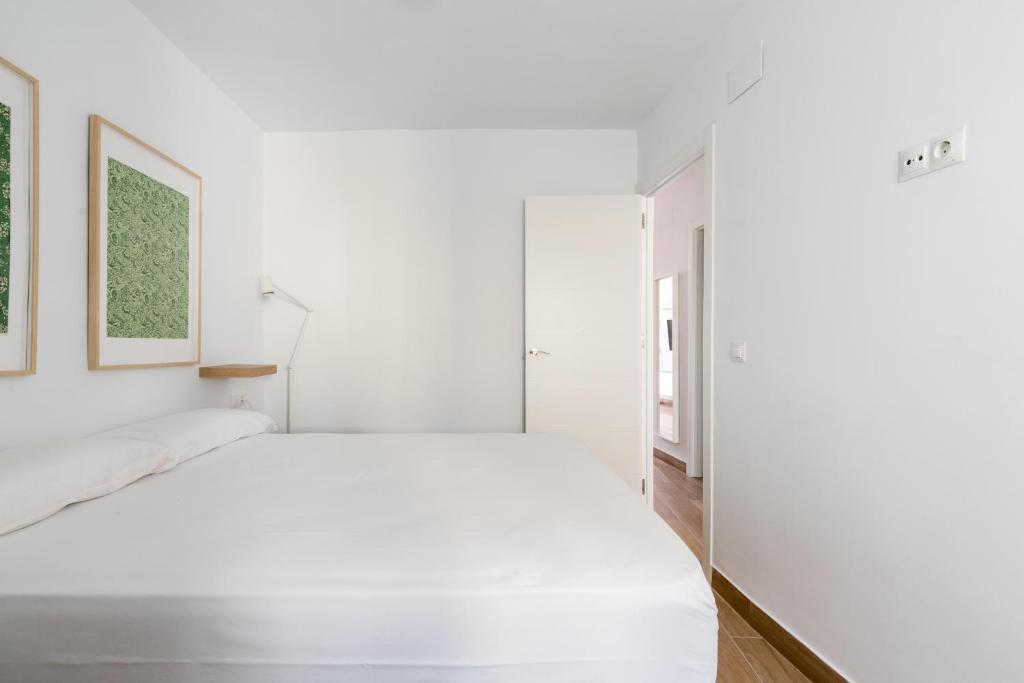 Postel nebo postele na pokoji v ubytování Holi-Rent Pureza
