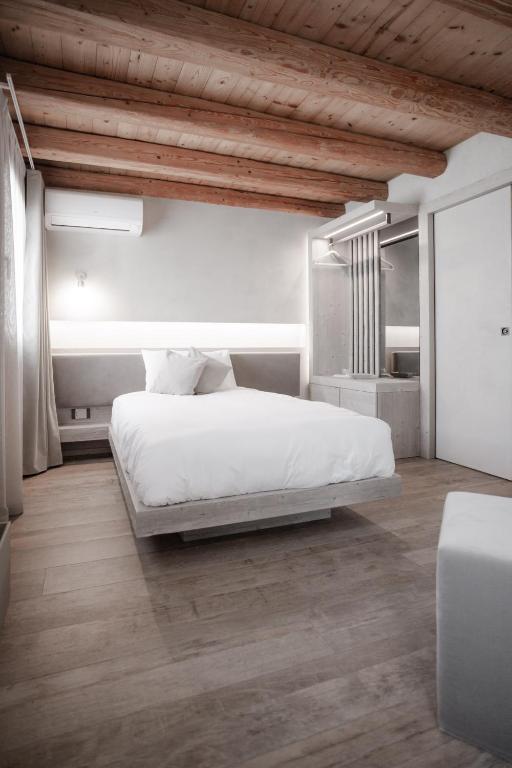 Posteľ alebo postele v izbe v ubytovaní Locanda MaMaGiò