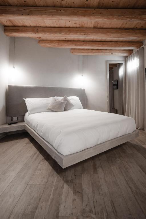 Posteľ alebo postele v izbe v ubytovaní Locanda MaMaGiò