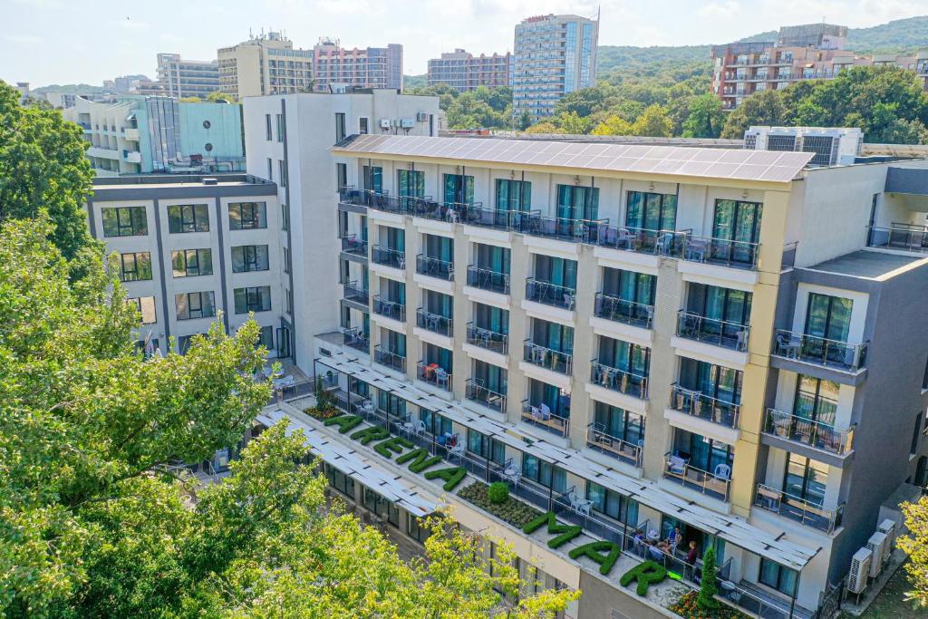 an aerial view of a building in a city at Arena Mar Hotel and SPA in Golden Sands