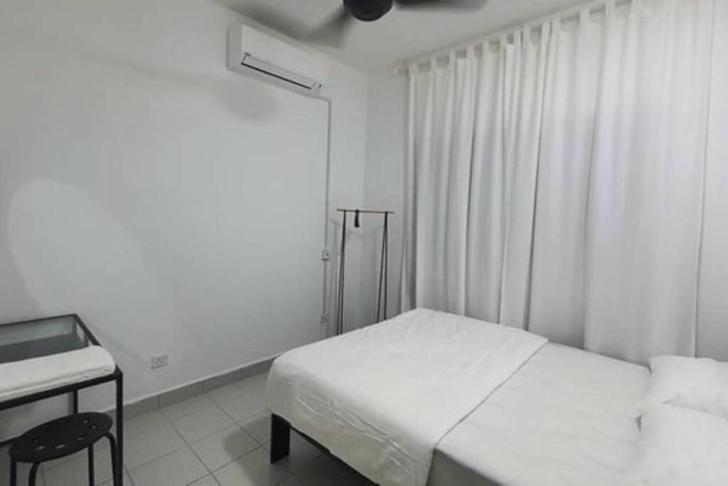 Postel nebo postele na pokoji v ubytování Double AS Homestay