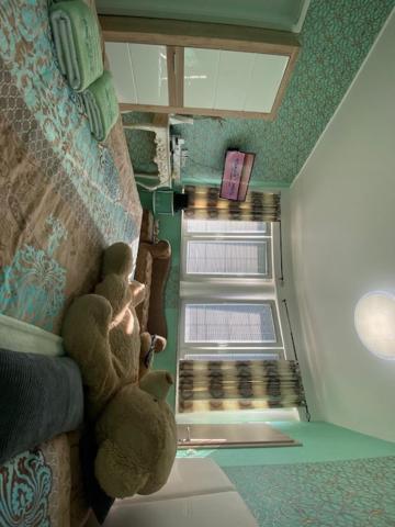 Posezení v ubytování Room Oaza Miru