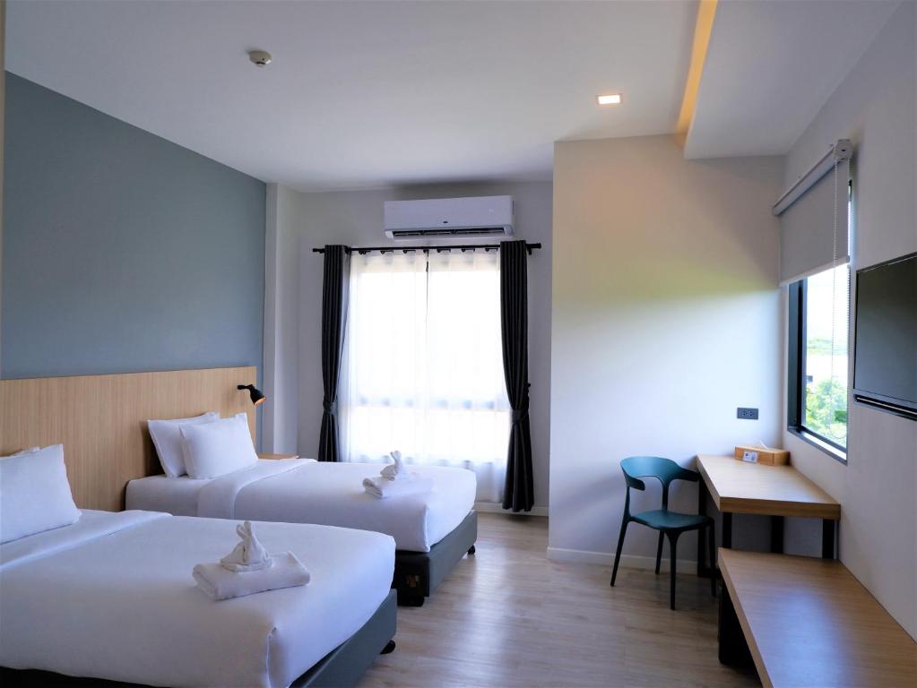 bliQ Hotel Chanthaburiにあるベッド