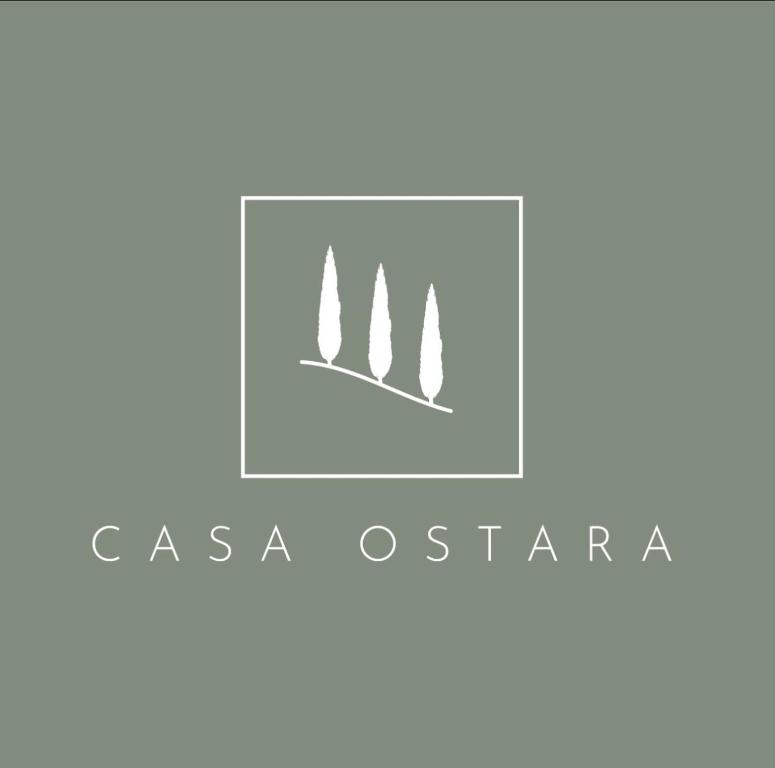 ein Logo für ein Start-up mit zwei Türmen in der Unterkunft Casa Ostara in Condorcet