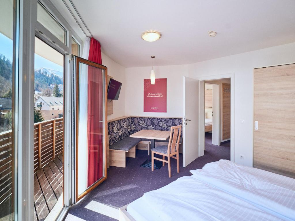 Postel nebo postele na pokoji v ubytování Hotel Planai by Alpeffect Hotels