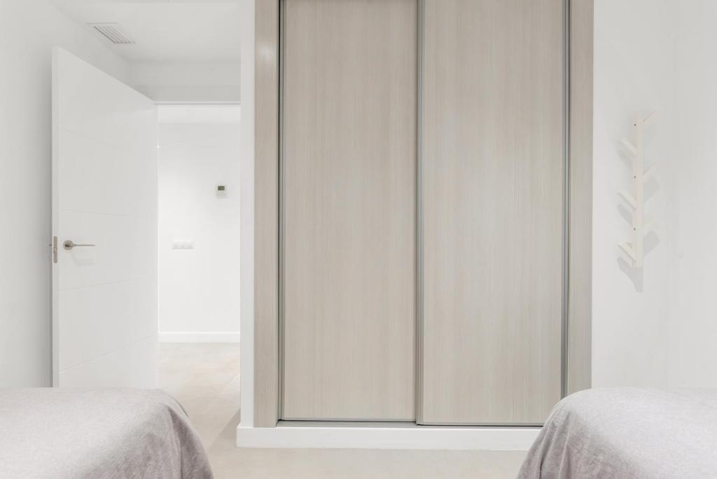 Posteľ alebo postele v izbe v ubytovaní Large apartment in Playas del Duque